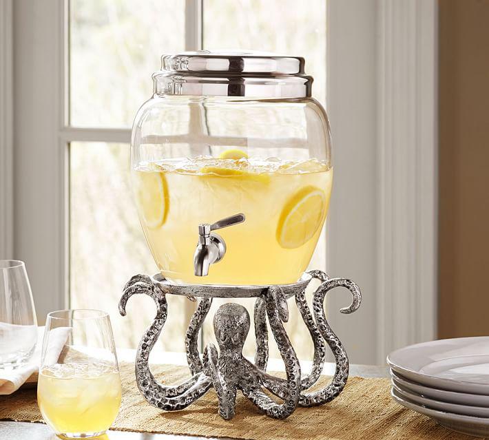 Classic Small Glass Drink Dispenser, $59, and Octopus Dispenser Stand, $59 at Pottery Barn
