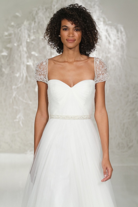 Model walks runway in a gown from the Watters Spring 2016 bridal runway show by Vatana Watters, during New York Bridal Fashion Week Spring 2016.