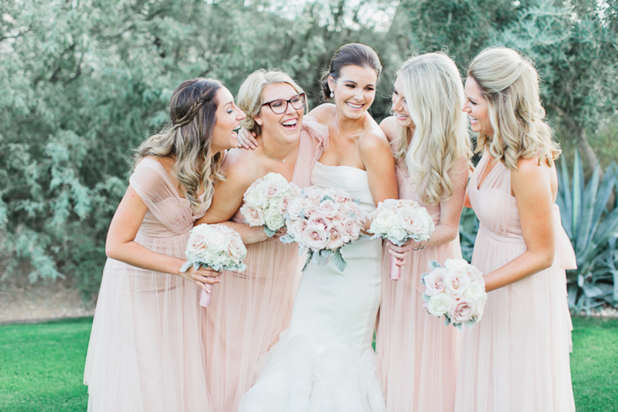 blush bridesmaids with neutral bouquets _ chic romantic wedding