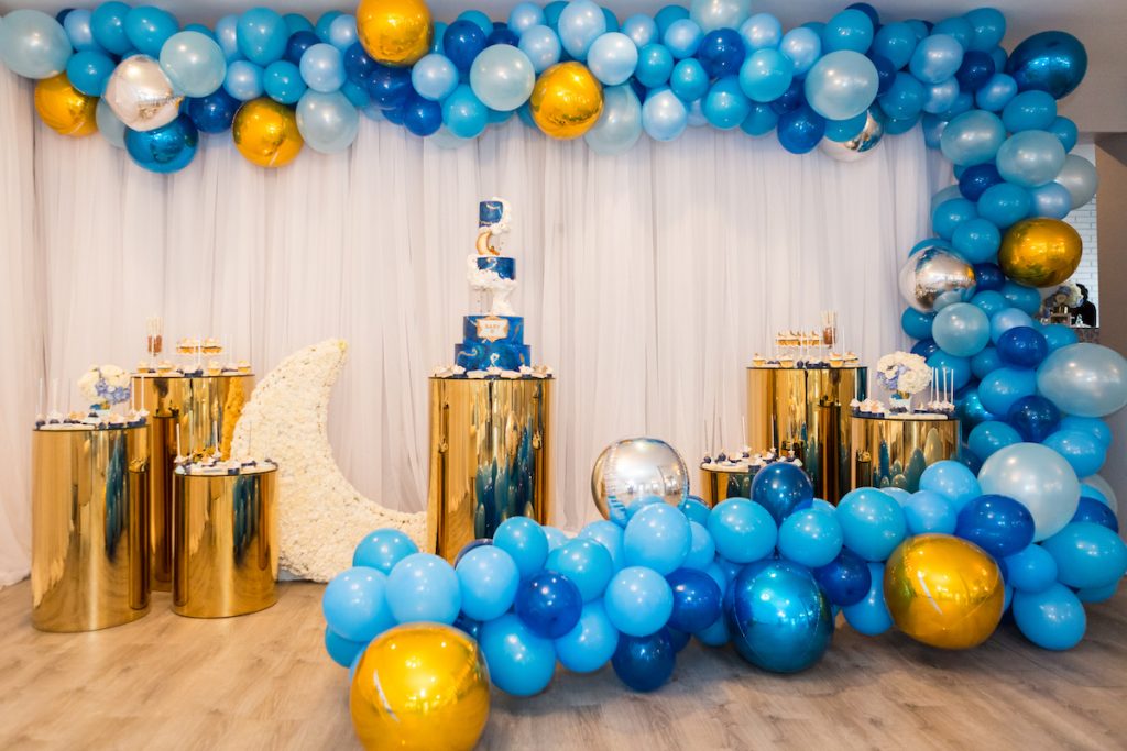 blue and gold balloon display