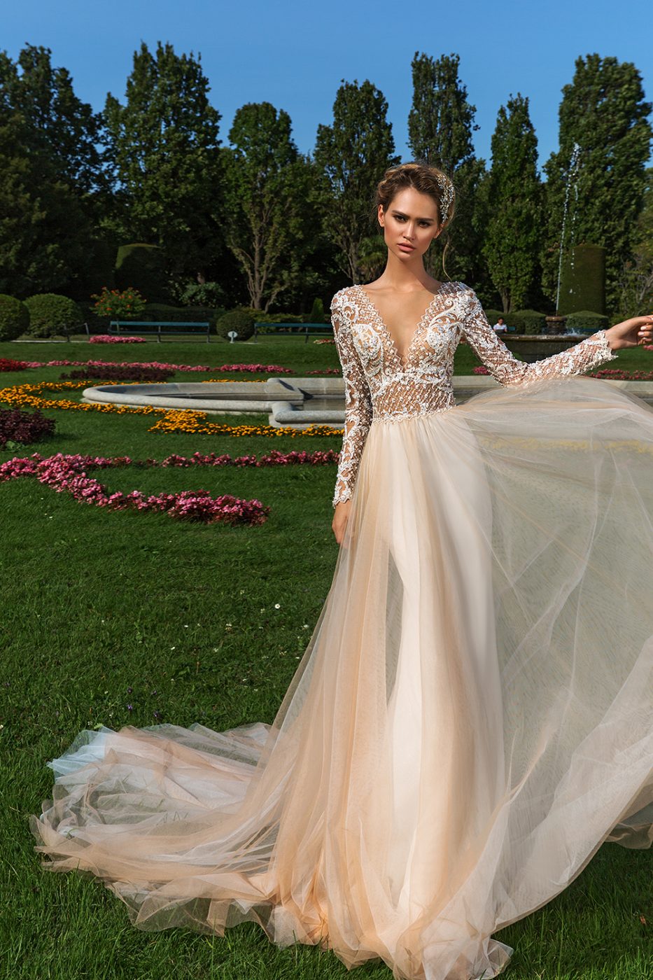 plunge neckline wedding dress by Crystal Design Couture