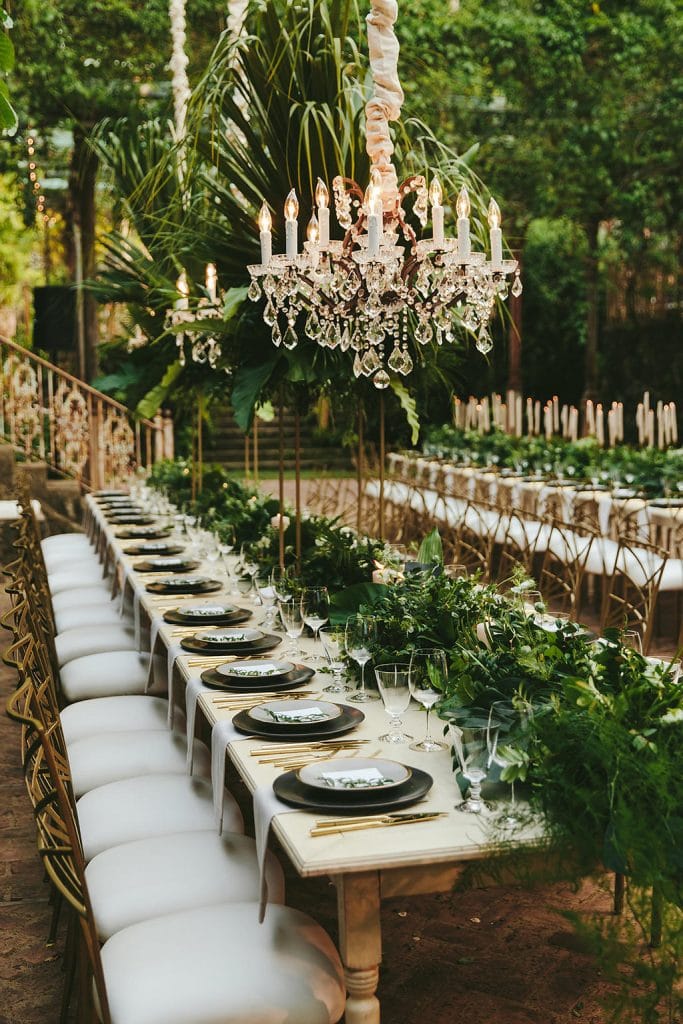 outdoorhanging chandelier and greenery decor 