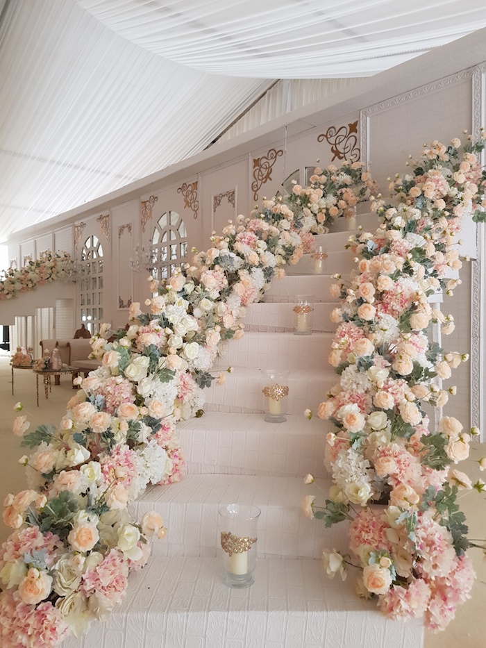floral wrapped stairway