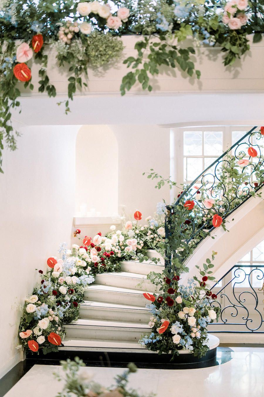 Lush floral wrapped stairway