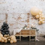 wedding balloon decor frames a simple cake table