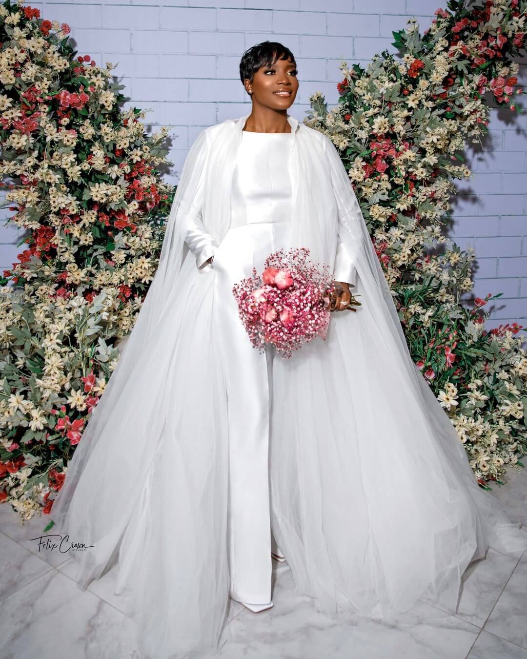 long sleeved white pantsuit with cape train for wedding